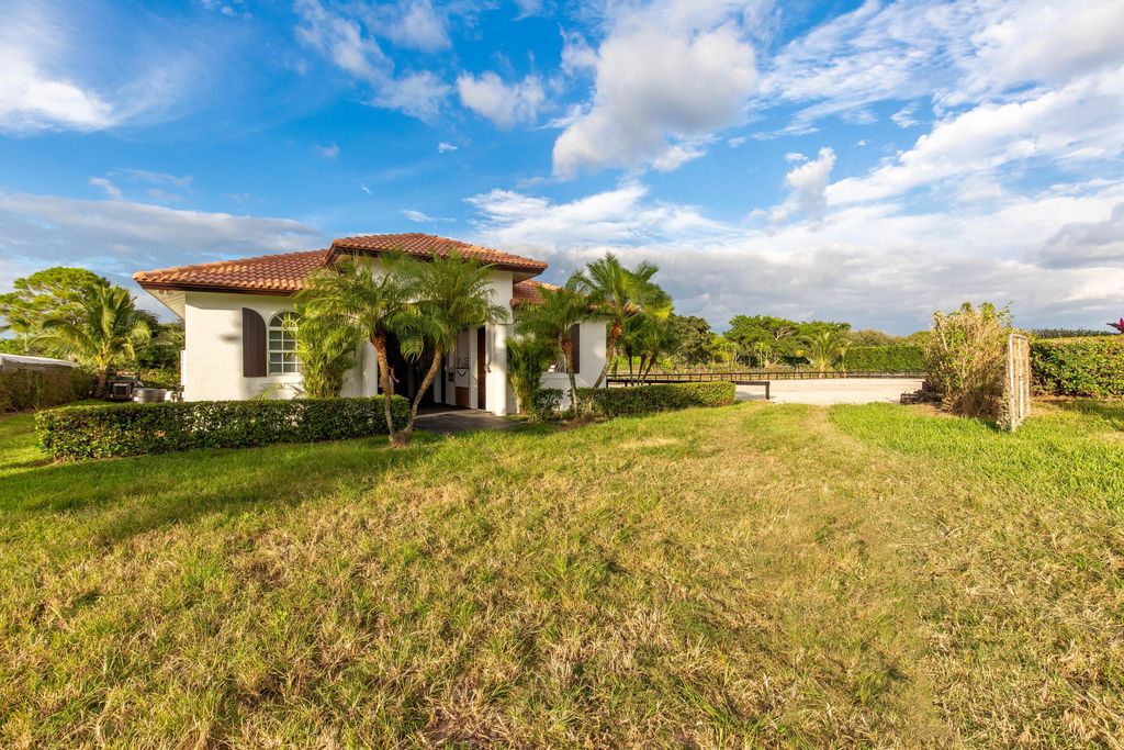 Photo of 14367 Belmont Trace, Wellington, FL 33414 (MLS # B26002685)