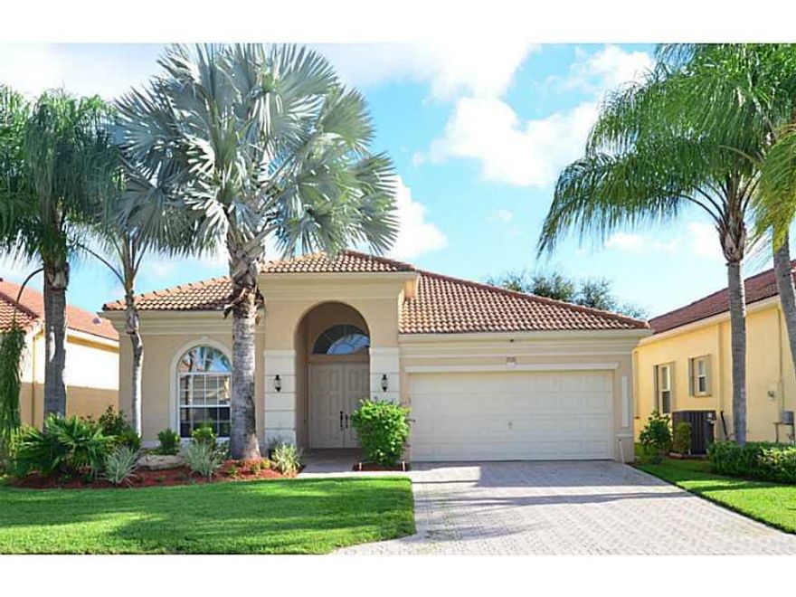 You must see this gorgeous, newly renovated home in the sought after gated community of Vizcaya. Enjoy lake views from the opened up kitchen, living room, master BR & screened patio! Updates include SS Appliances w/ 5 year warranty, wooden cabinets with p ullouts and soft close, granite counter-tops,  BRAND NEW BATHROOMS, granite in guest bathroom with quartz countertop and 24' porcelain tile in the Master, new carpet in all bedrooms, AC/Water Heater both less than 3 years old, smartkey locks on all doors.