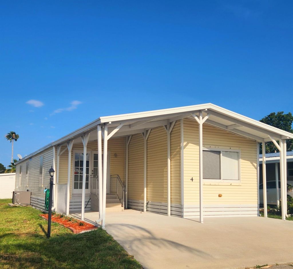 Photo of 4 SE Los Gatos Lane, Port Saint Lucie, FL 34952 (MLS # R11065072)