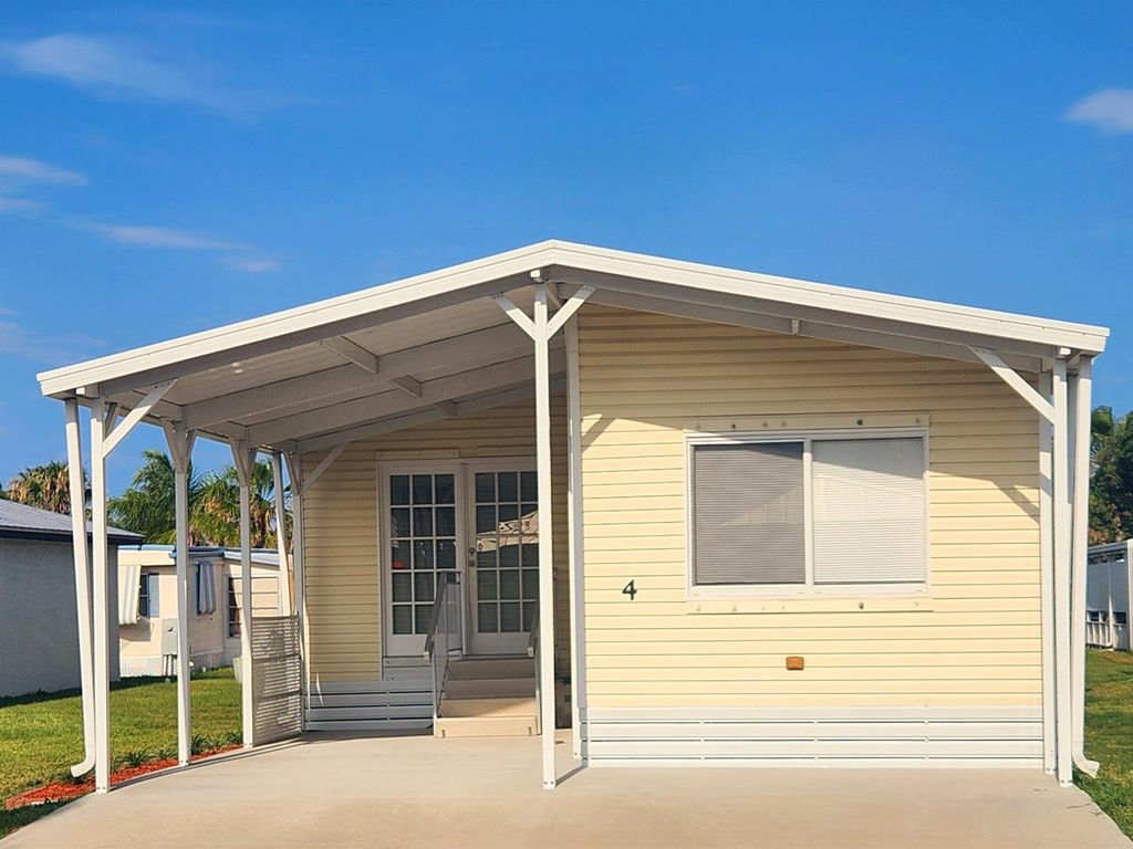 Photo of 4 SE Los Gatos Lane, Port Saint Lucie, FL 34952 (MLS # R11065072)