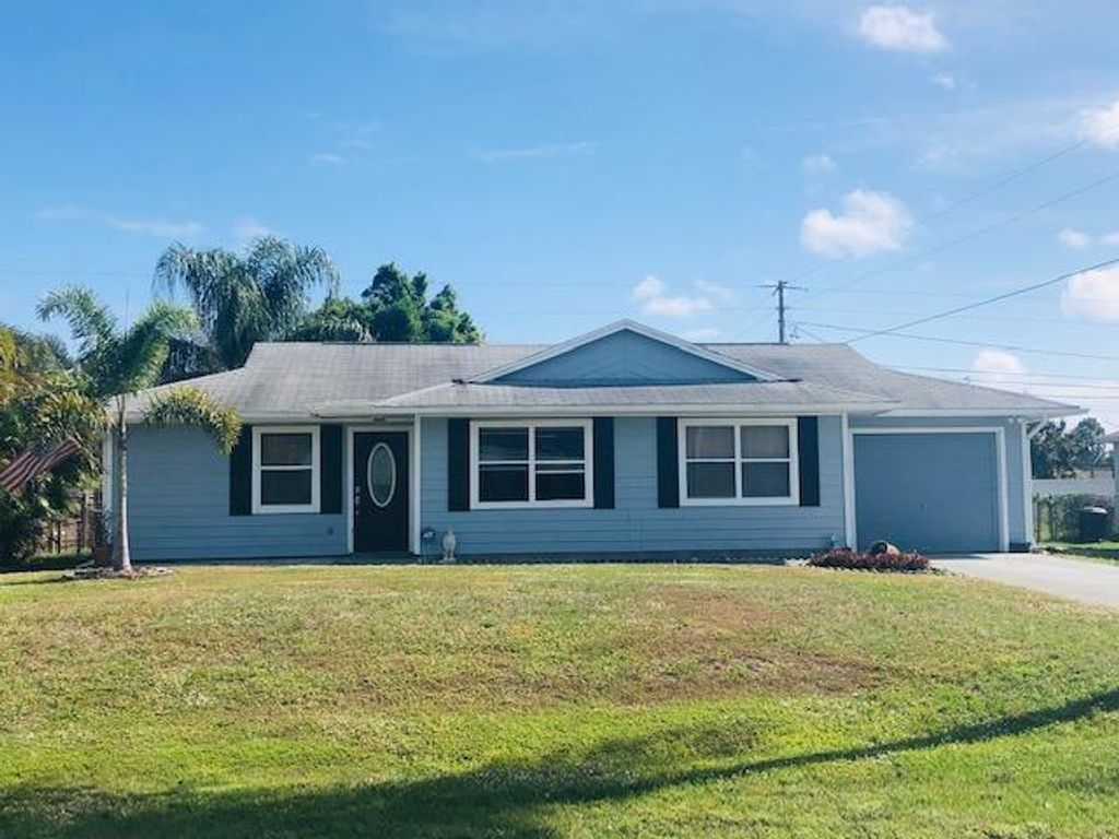 Photo of 1953 SW Idaho Lane, Port Saint Lucie, FL 34953 (MLS # R10701416)