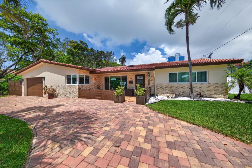Beautiful turn key home offering split 3 bedroom/ 2 bath floor plan with pool at end of quiet street. Minutes to beach and shopping. House offers following recent upgrades: All plumbing lined, New AC 2025, New Water heater 2024, New Dishwasher 2025, New exterior painting 5/2026 and roof pressure cleaned and sealed 5/2026, Updated exterior lighting, New Swim Spa control panel on pool 2026. One car garage with side of house storage for nice size boat or RV., Large work shed also. Fully open air sliding glass windows from living to patio for maximum walk through. Hurricane windows through out home. Ex-large screened in back patio with ceiling fans. Resort style above pool with jets. Open kitchen for entertaining.