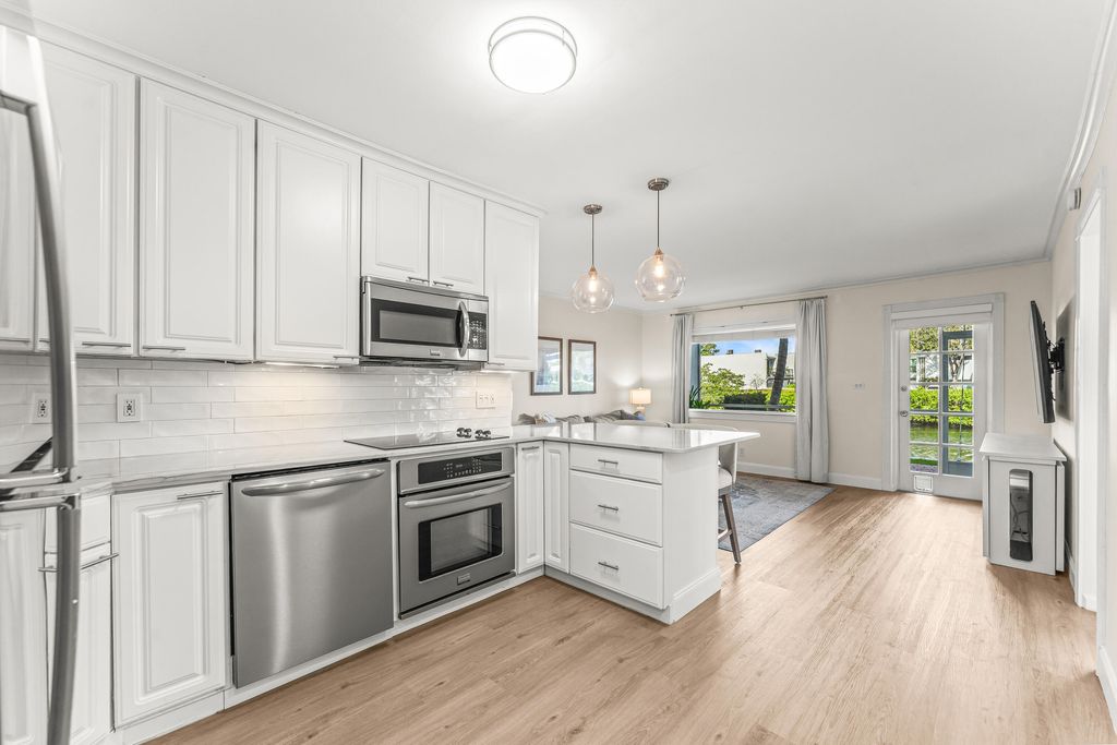 Photo of 801 NE 18th Ct #Apt 111, Fort Lauderdale, FL 33305 (MLS # B26001027)