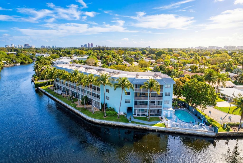 Photo of 801 NE 18th Ct #Apt 111, Fort Lauderdale, FL 33305 (MLS # B26001027)