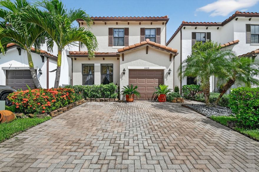 Drastically reduced price for immediate sale. Seller's loss is your gain.
Spacious 4 bed, 3.5 bath single family home with a Primary suite on the first floor and another en suite on the second floor of this 2161 sq ft of living space. This charming Mediterranean-inspired property has incredible curb appeal, featuring a stucco exterior, tile roof, and a wide brick paver driveway. The lush, tropical landscaping creates a welcoming and private entrance to the one-car garage. 
Includes essential appliances like a dishwasher, electric range, refrigerator, washer, and a valuable owned water softener/filter system. This beautiful two-story home is a must-see with no neighbors behind!