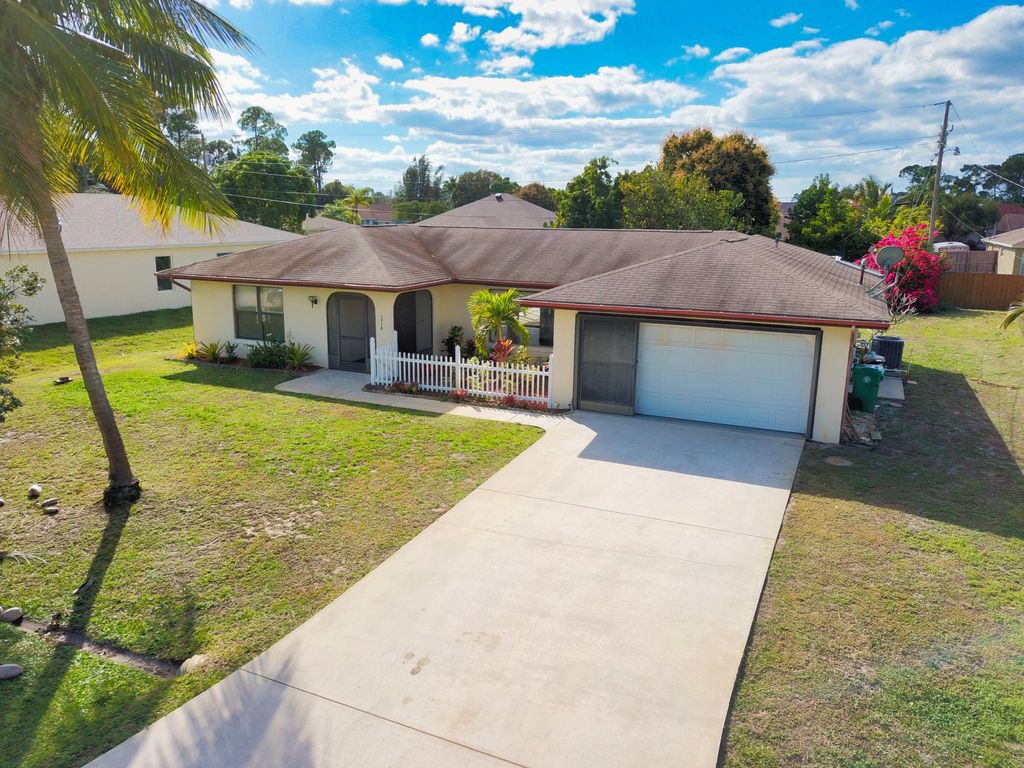 Photo of 1218 SE Nancy Lane Ln, Port St Lucie, FL 34983 (MLS # R10771393)