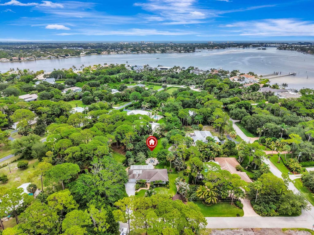 Photo of 5531 HIBISCUS Road, Jupiter, FL 33458 (MLS # B26069882)