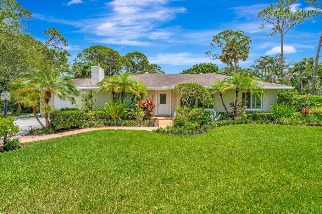 Photo of 5531 HIBISCUS Road, Jupiter, FL 33458 (MLS # B26069882)