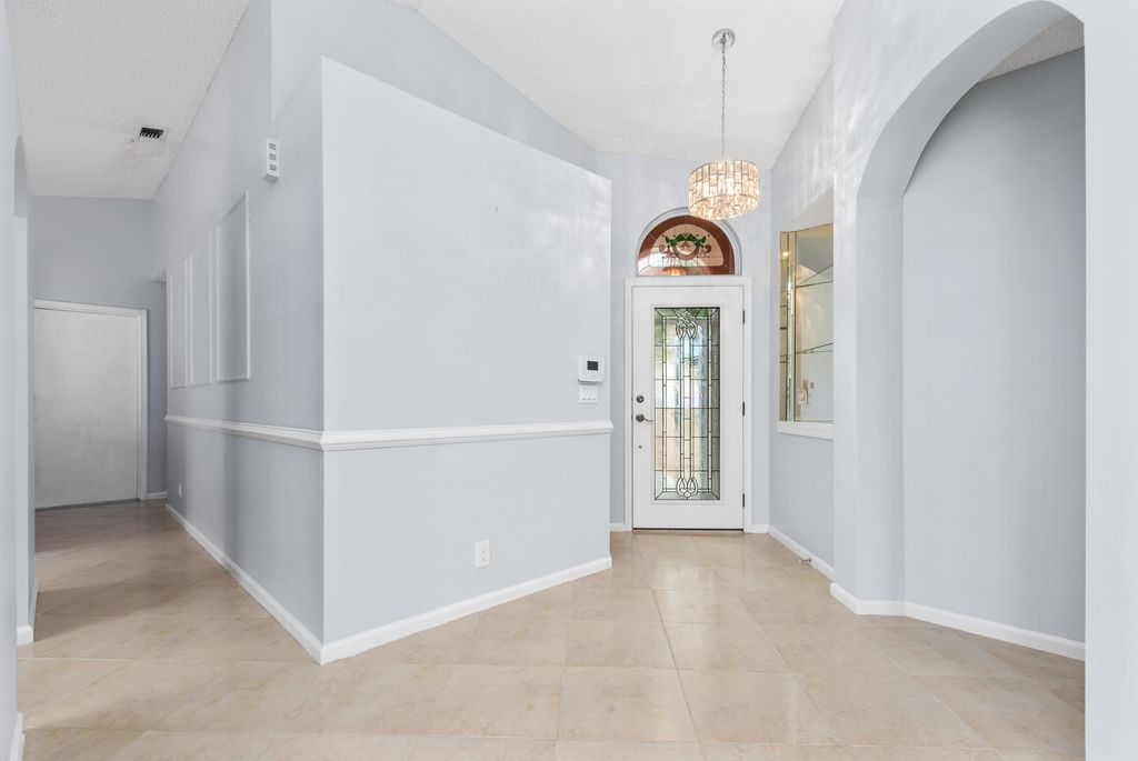 Photo of 2219 SW Shoal Creek Trace, Palm City, FL 34990 (MLS # R11019127)