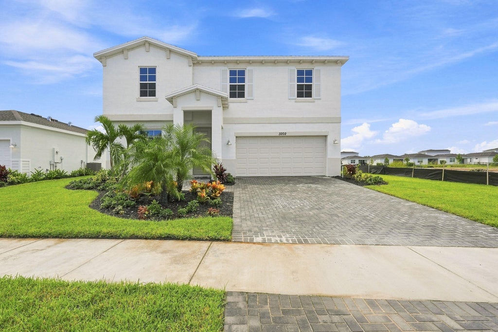 Photo of 3202 SPANISH CEDAR Place, Fort Pierce, FL 34946 (MLS # B26069196)
