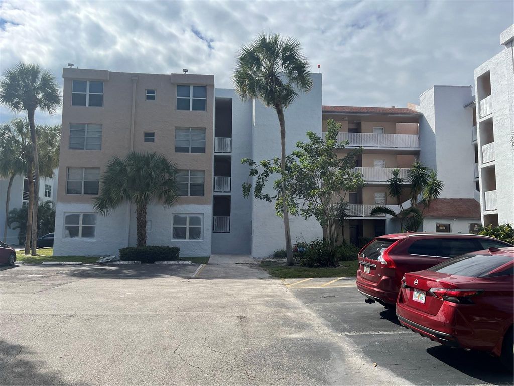 Photo of 9440 Live Oak Pl #306, Davie, FL 33324 (MLS # F10532830)