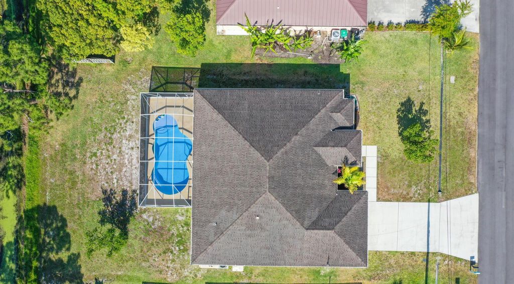 Photo of 1062 SW Romaine Lane, Port Saint Lucie, FL 34953 (MLS # R11087831)