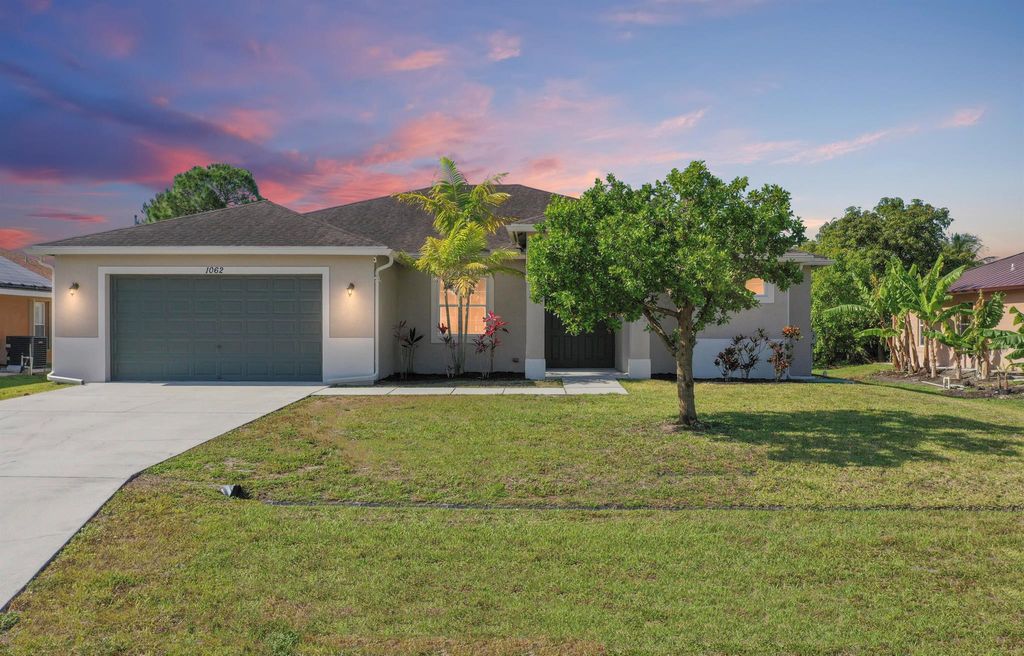 Photo of 1062 SW Romaine Lane, Port Saint Lucie, FL 34953 (MLS # R11087831)