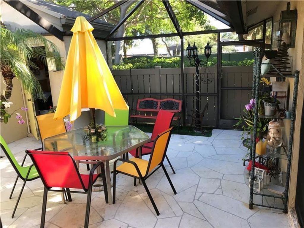 Photo of 4871 NW 22nd Street, Coconut Creek, FL 33063 (MLS # R10687836)