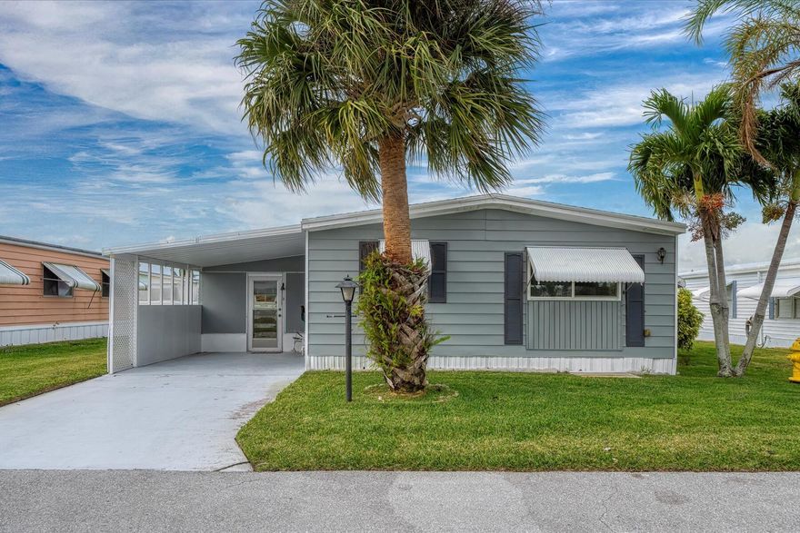 Welcome to your dream retreat at 261 Cameo Way, Jensen Beach, FL! Nestled in the sought-after 55+ community of Pinelake Village, this beautifully remodeled 2-bedroom, 2-bathroom home offers the perfect blend of comfort and convenience. Step inside to discover a spacious, open-concept layout featuring a brand-new kitchen with stainless steel appliances, quartz countertops, and stylish backsplash. The bathrooms have been thoughtfully updated with modern vanities and elegant finishes. The master suite boasts a large walk-in closet, providing ample storage space. Enjoy the enclosed sunroom, perfect for relaxing or entertaining. The home comes fully furnished, making it move-in ready. Additional highlights include new flooring, updated windows with blinds, and a new roof (2022). Pinelake Village offers fantastic amenities, including a clubhouse, pool, hot tub, shuffleboard, and RV/boat storage. Located just minutes from the beach, shopping, and dining, this golf-cart-friendly community is ideal for active adults seeking a vibrant lifestyle.  Don't miss this opportunity to own a piece of paradise schedule your showing today!