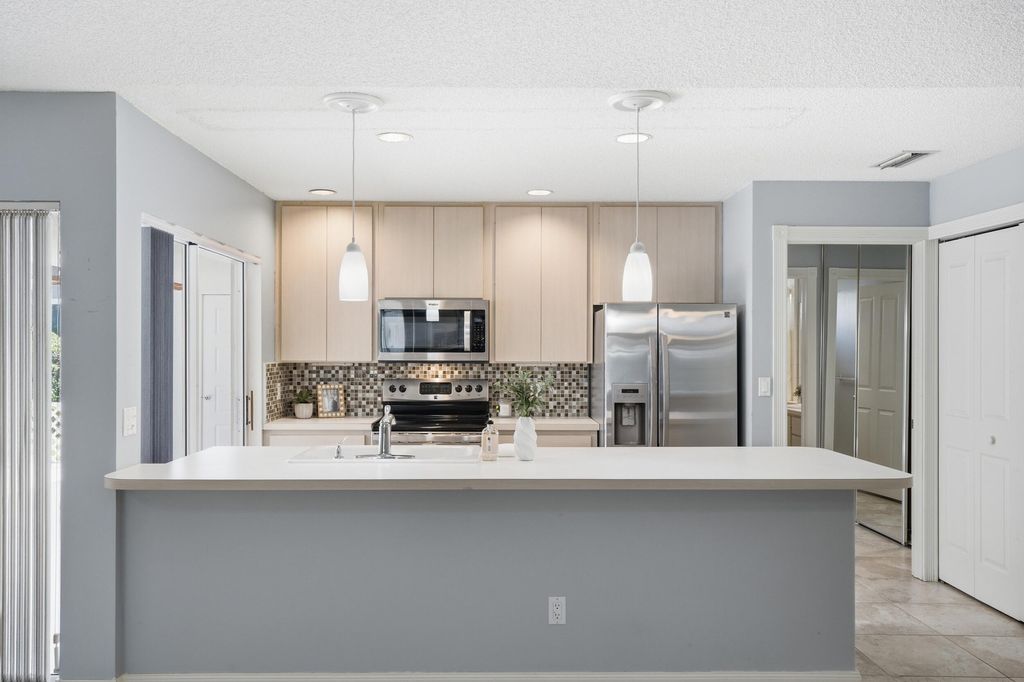 Photo of 10701 Chapman Oak Court, Palm Beach Gardens, FL 33410 (MLS # B26052931)