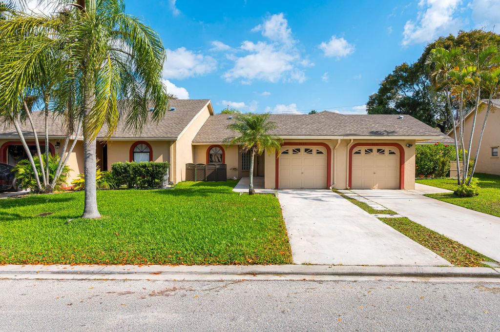 Photo of 9665 NW 76th Court, Tamarac, FL 33321 (MLS # B26013565)