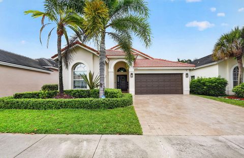 Photo of 7070 Charleston Point Drive, Lake Worth, FL 33467 (MLS # B26039348)