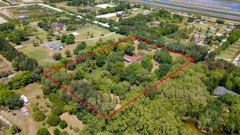 Photo of 16688 Rustic Road, Wellington, FL 33470 (MLS # B26021678)