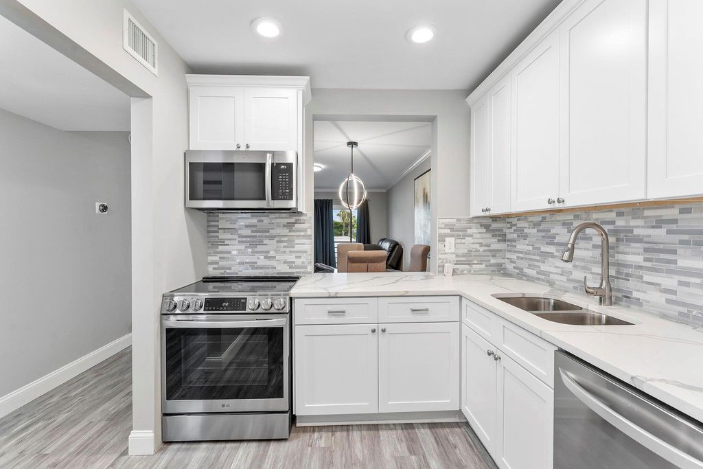 Photo of 118 Lake Constance Drive, West Palm Beach, FL 33411 (MLS # R11137011)