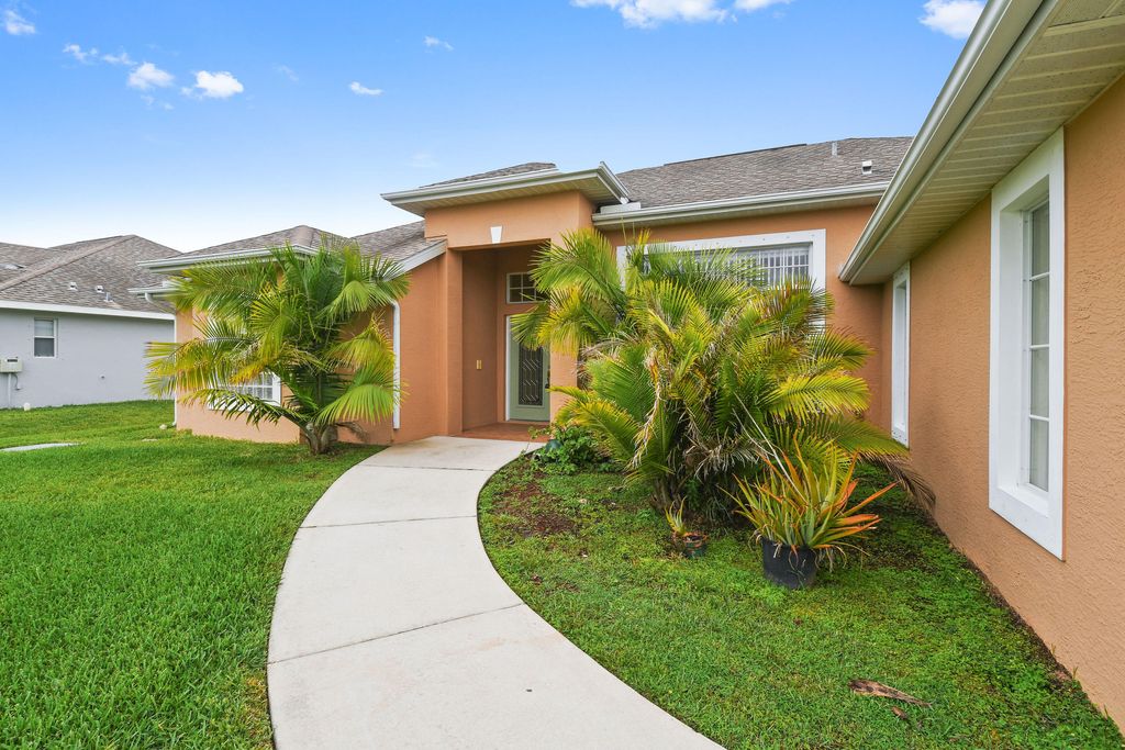 Photo of 2650 SW Import Drive, Port Saint Lucie, FL 34987 (MLS # R10799644)