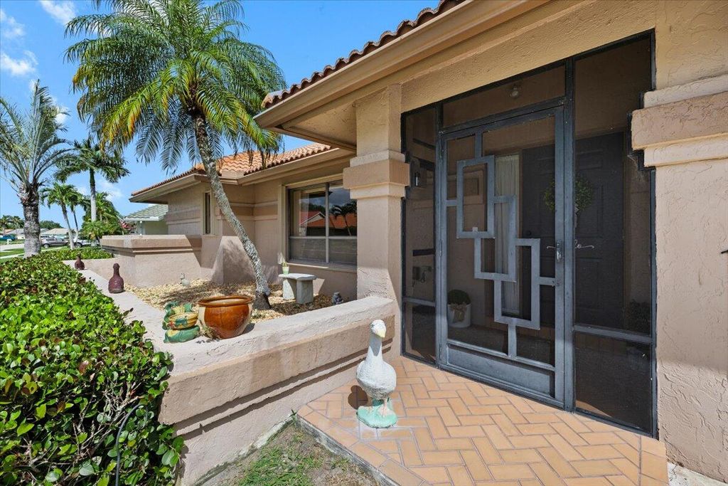 Photo of 9615 Sun Pointe Drive, Boynton Beach, FL 33437 (MLS # B26012525)