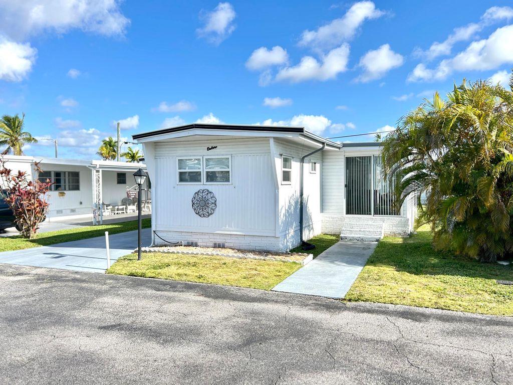 Photo of 3233 State Street, Hollywood, FL 33021 (MLS # B26023496)