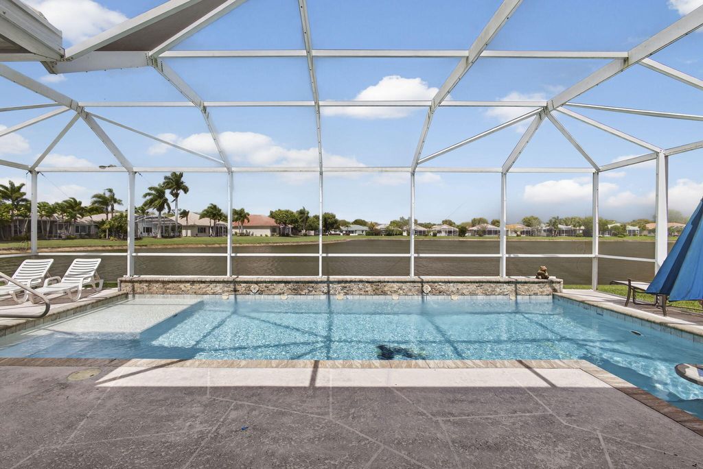 Photo of 9271 Heron Cove Drive, West Palm Beach, FL 33411 (MLS # R11117994)