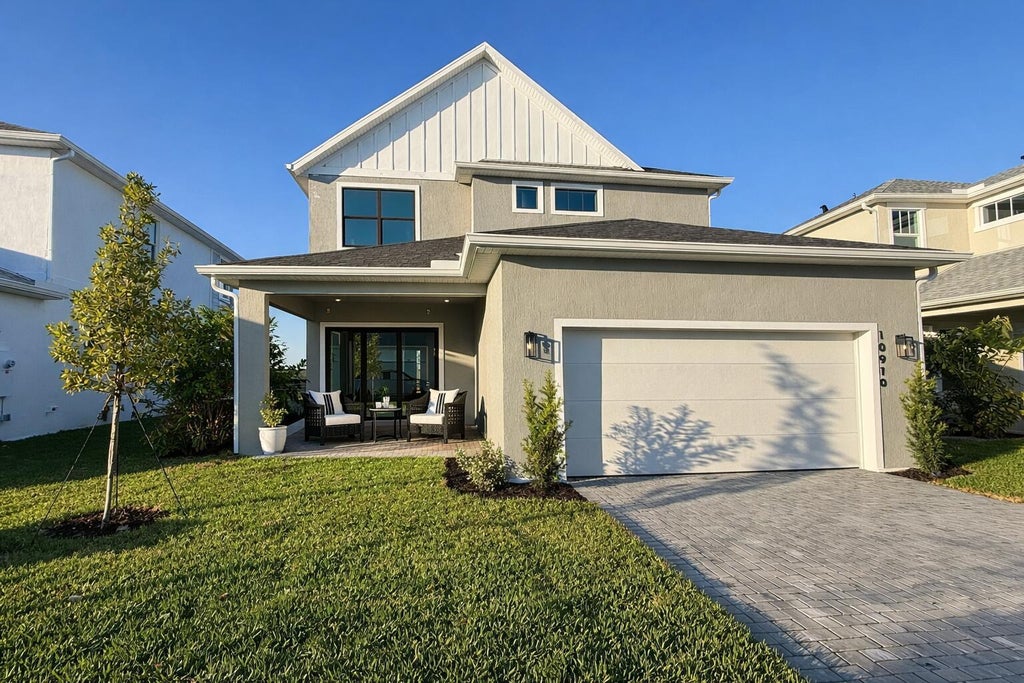 Photo of 10910 SW Pioneer Parkway, Palm City, FL 34990 (MLS # B26063327)