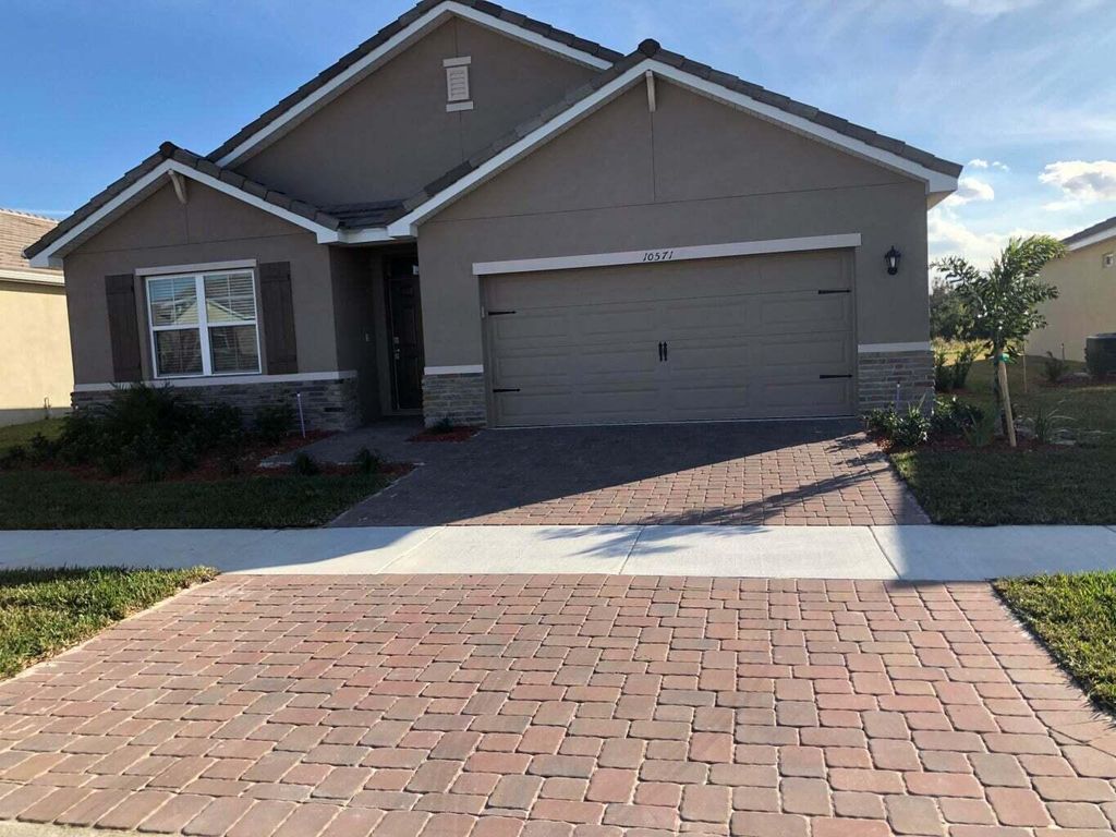 Photo of 10571 SW Toren Way, Port Saint Lucie, FL 34987 (MLS # B26006357)