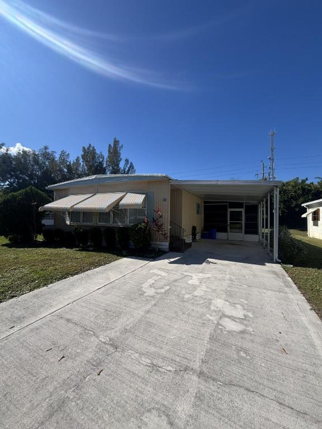 Photo of 222 W W Caribbean, Port Saint Lucie, FL 34952 (MLS # R11142353)