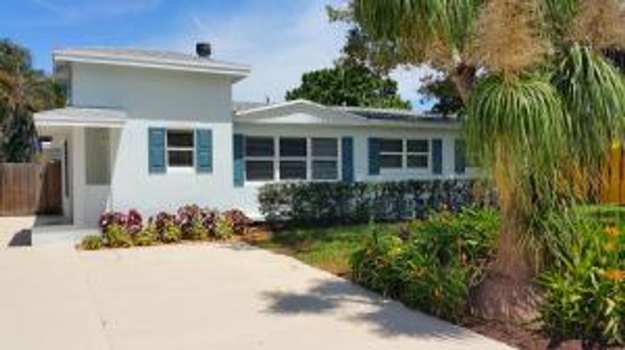 PRICE REDUCED! Rare opportunity to own one of a kind property in Lake Osborne Estates. Adorable Key West style home featuring 3 bedrooms, 3 full baths & pool. Just steps away from the lake, bring your boat! This home was completely gutted in 2008, taken down to the studs & restored from the ground up. All work permitted and built strictly to PB County Building Code. Work Included: New roof, hurricane impact windows & doors throughout, wood blind window treatments, new kitchen, SS appliances, new bathrooms, new walls, new floors, new plumbing, new electrical, new digital irrigation & landscaping. In addition this lovely home features 2 bonus pool-side rooms:  a professionally built sound studio & conveniently located 16x15 storage room. Potentially extra bedrooms!