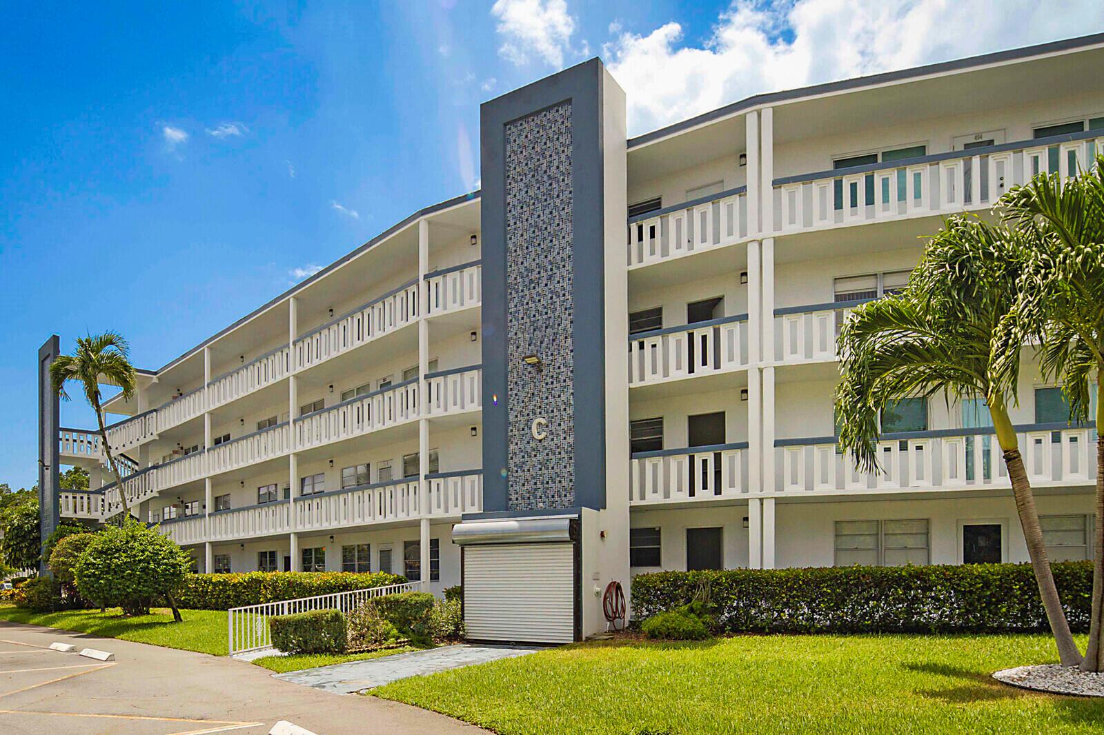 This beautiful fully renovated 2-bedroom, 2-bathroom condo in Century Village Deerfield Beach is a rare opportunity to enjoy a brand-new home in a vibrant 55+ community. Perched on the 3rd floor with peaceful views of lush green space which will soon be transformed into a beautiful park and walking path, this residence has been fully upgraded from top to bottom. Inside, you'll find wood-look tile throughout, impact windows and doors, a fully renovated kitchen with quartz countertops, new appliances, and new bathrooms designed with modern finishes. The renovations include all new electrical work with a new panel, new plumbing, and a newer AC, ensuring both comfort and peace of mind. Spacious, bright, and thoughtfully designed, this home is move-in ready. With no current assessments and
