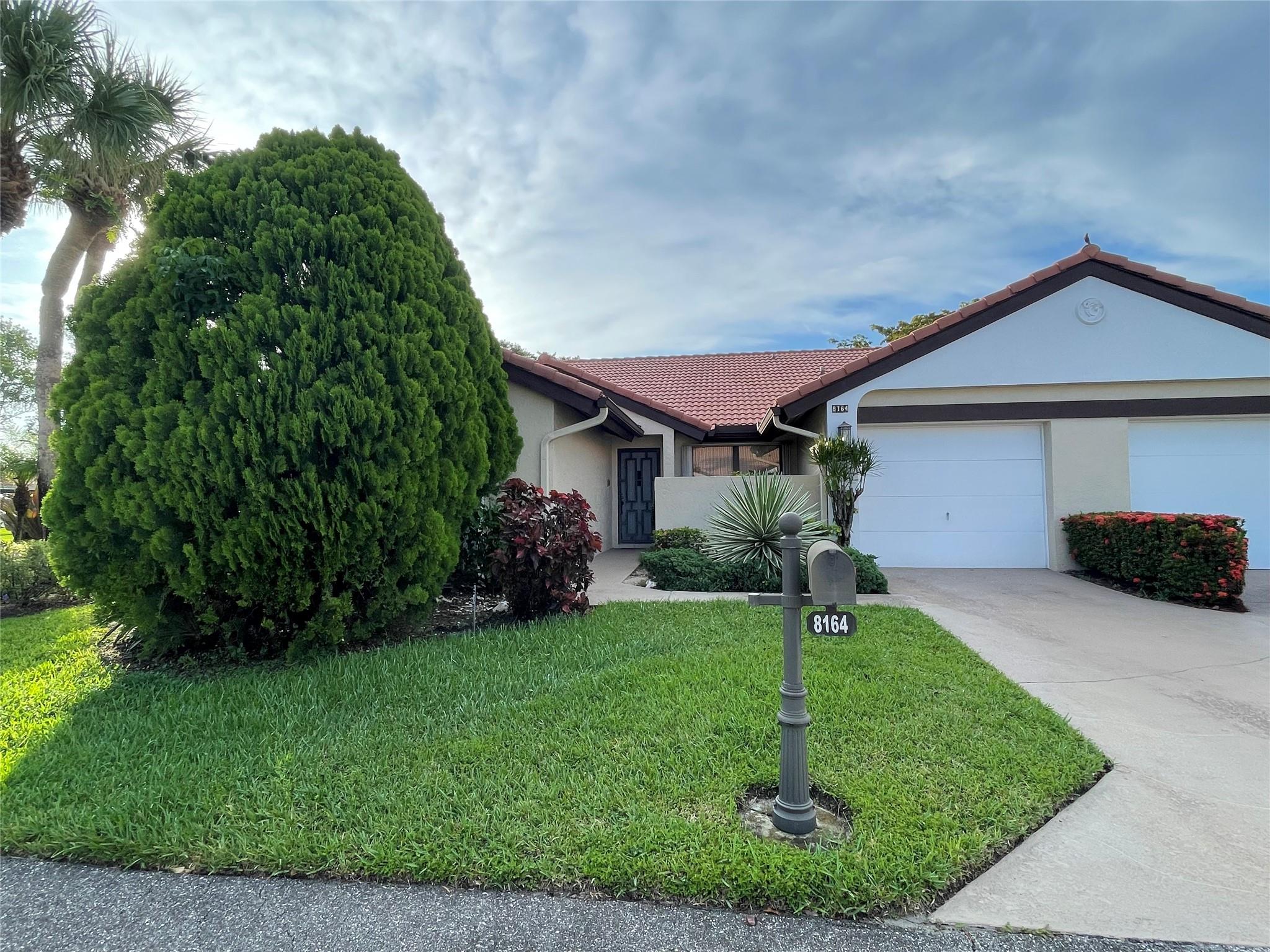 DON’T MISS THIS OPPORTUNITY TO LIVE IN A BEAUTIFUL VILLA IN THE MOORINGS - A NON-EQUITY SECTION OF ABERDEEN EAST. This home has an open floor plan with a huge living room area. The enclosed Florida room is under air conditioning. This end unit has a spectacular lake view, complete with hurricane shutters, ceiling fans and a garage. Ensuite master bedroom with Jacouzi Roman tub. 55+ community with 3 pools, clubhouse, fitness center, pickle ball, tennis courts, and more. HOA includes Comcast Triple Play (internet, tv & phone), exterior insurance and painting, roof repairs, landscaping, irrigation, and planned clubhouse activities. Don’t miss this opportunity to live in paradise. This is the CAPRI Model. Required Capital Contribution of $1000 due at closing. MOTIVATED SELLER.