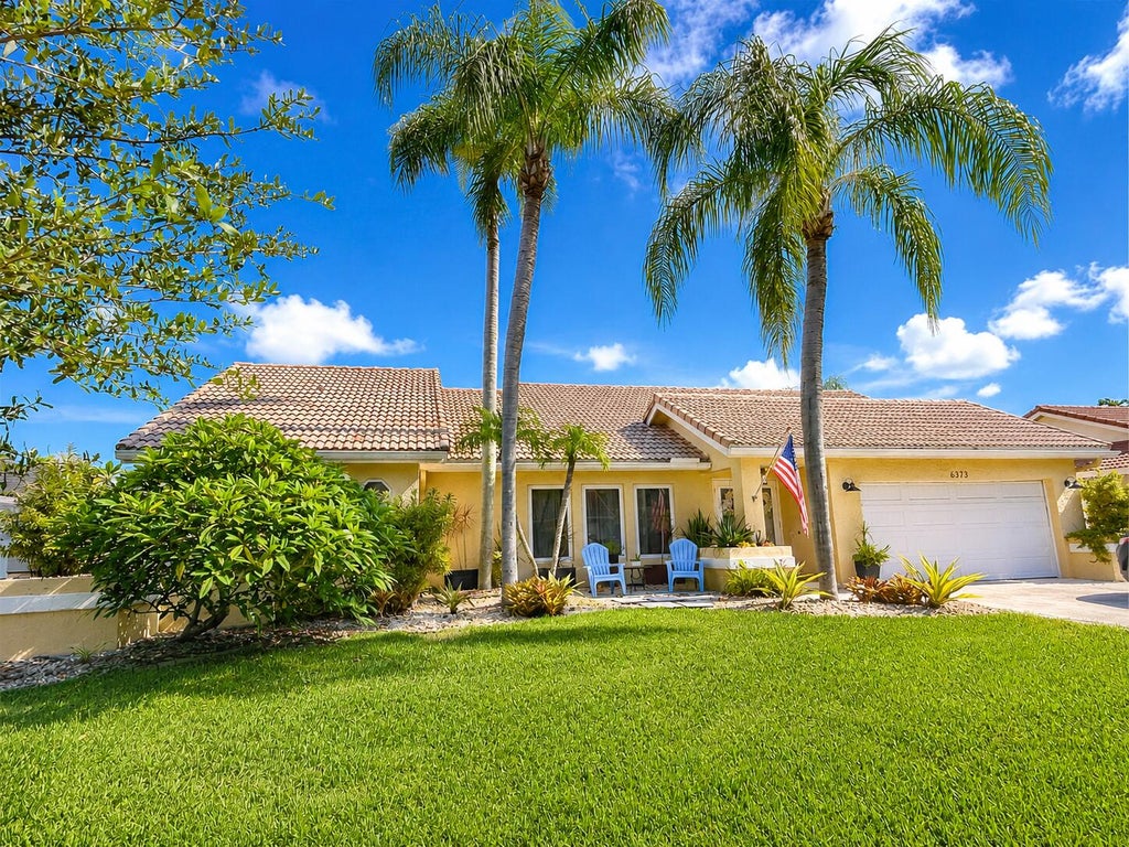 Photo of 6373 NW 55th Manor, Coral Springs, FL 33067 (MLS # B26063696)