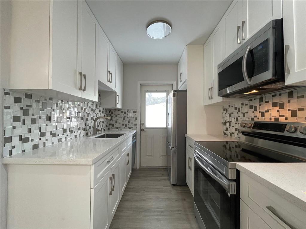 This charming duplex is conveniently located near Publix and Whole Foods, offering a very private setting on a quiet, dead-end street. Features include wood-look flooring throughout the entire property, stainless steel appliances, quartz countertops, and modern shaker cabinets. Additional conveniences include a private laundry room equipped with a washer and dryer. The rent includes water, sewer, trash, and extermination services. TENANT OCCUPIED UNTIL 8/22/25. CALL FOR APPT.
