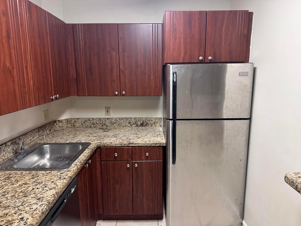 Photo of 10773 CLEARY Boulevard #110, Plantation, FL 33324 (MLS # B26064997)
