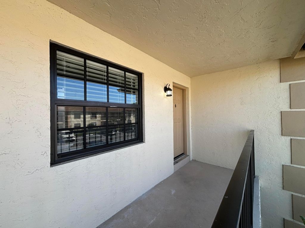 Photo of 302 Pinecrest Circle #D, Jupiter, FL 33458 (MLS # R10961935)