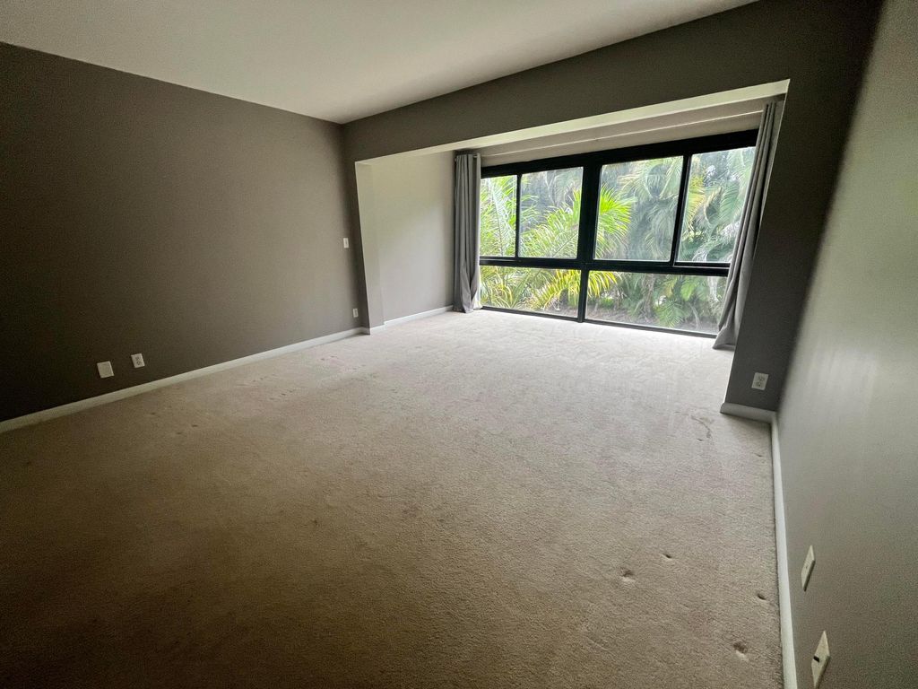 Photo of 1700 Presidential Way #203, West Palm Beach, FL 33401 (MLS # B26035733)