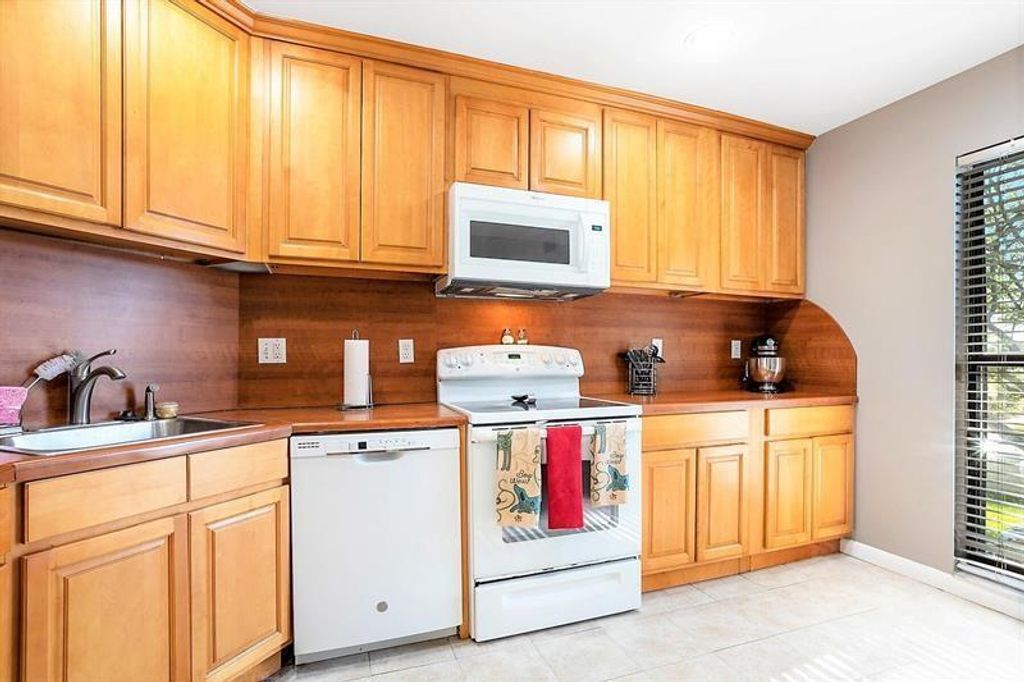 Photo of 1700 Presidential Way #203, West Palm Beach, FL 33401 (MLS # B26035733)