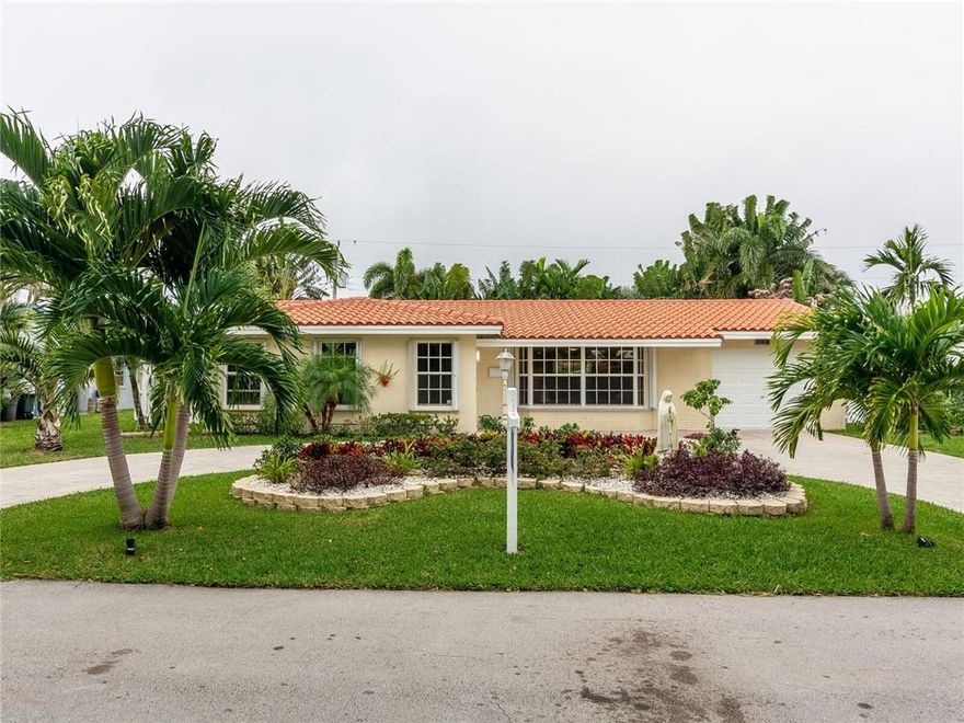 Welcome Home! Enjoy living in this quiet and friendly neighborhood in a prime Lighthouse Point location east of US1. Nice open concept and beautiful flooring throughout the house. Brand new carpet in main bedroom. Kitchen with stainless steel appliances, marble countertops and peninsula. New roof (2019), new A/C with iWave-R Residential Air Cleaner (2020). French doors opening to a covered porch overlooking the fenced-in backyard with mature landscaping offering great privacy. New irrigation system with timer. Fresh paint (both interior and exterior).Great parks nearby, just a few blocks away from the beach. Plenty of restaurants and stores to choose from.