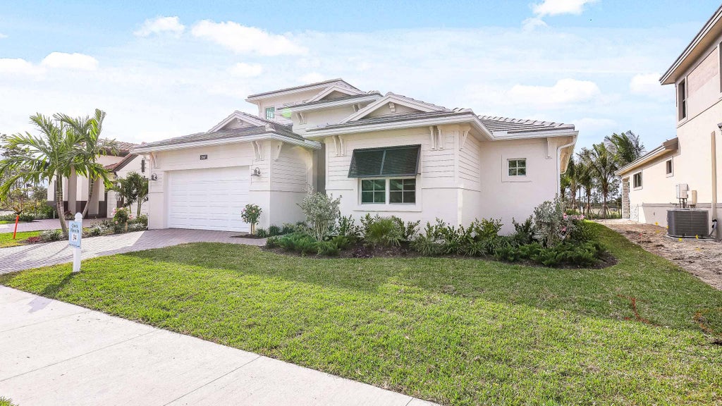 Photo of 13617 Le Christine Drive, Palm Beach Gardens, FL 33412 (MLS # R11022219)