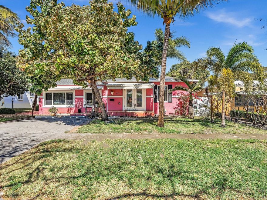 Located in desirable East Hollywood, just 2.5 miles to Hollywood Beach, in walking distance to Young Circle and Harrison Street nightlife. This versatile 3-bedroom, 3-bath home offers incredible flexibility and value. The main house features 2 bedrooms and 2 baths with a den that can be expanded to create a larger primary suite. Also, a private 1 bed/1 bath suite with separate entrance—perfect for guests, in-laws, or rental income. Enjoy a spacious backyard with a pergola, shed and dedicated workshop, mango tree and plenty of room to add a pool or park a boat/RV. Brand new roof (2026) and impact windows provide peace of mind and insurance savings. A rare opportunity with space, function, and potential all in one!