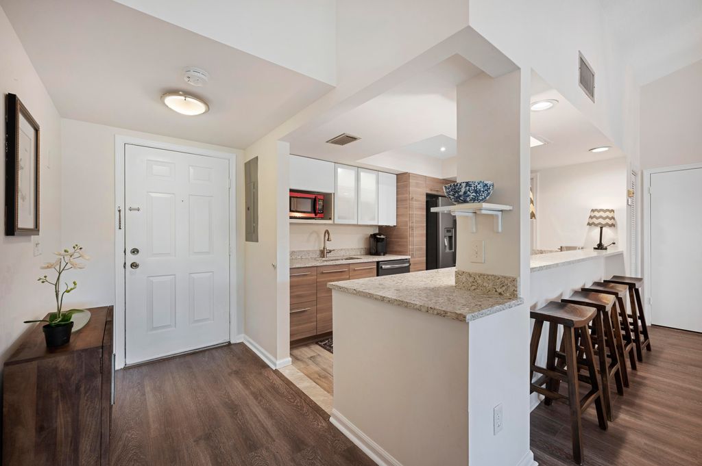 Photo of 11863 Wimbledon Circle #542, Wellington, FL 33414 (MLS # B26027648)