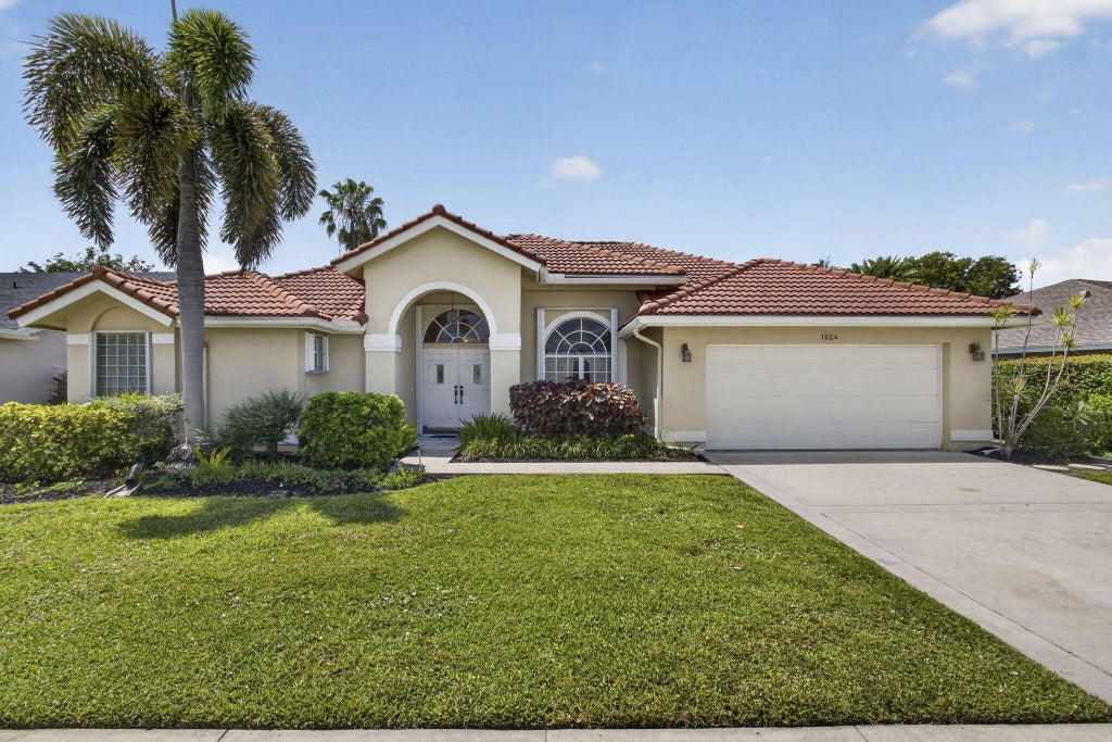 Photo of 1224 Lake Breeze Drive, Wellington, FL 33414 (MLS # B26045233)