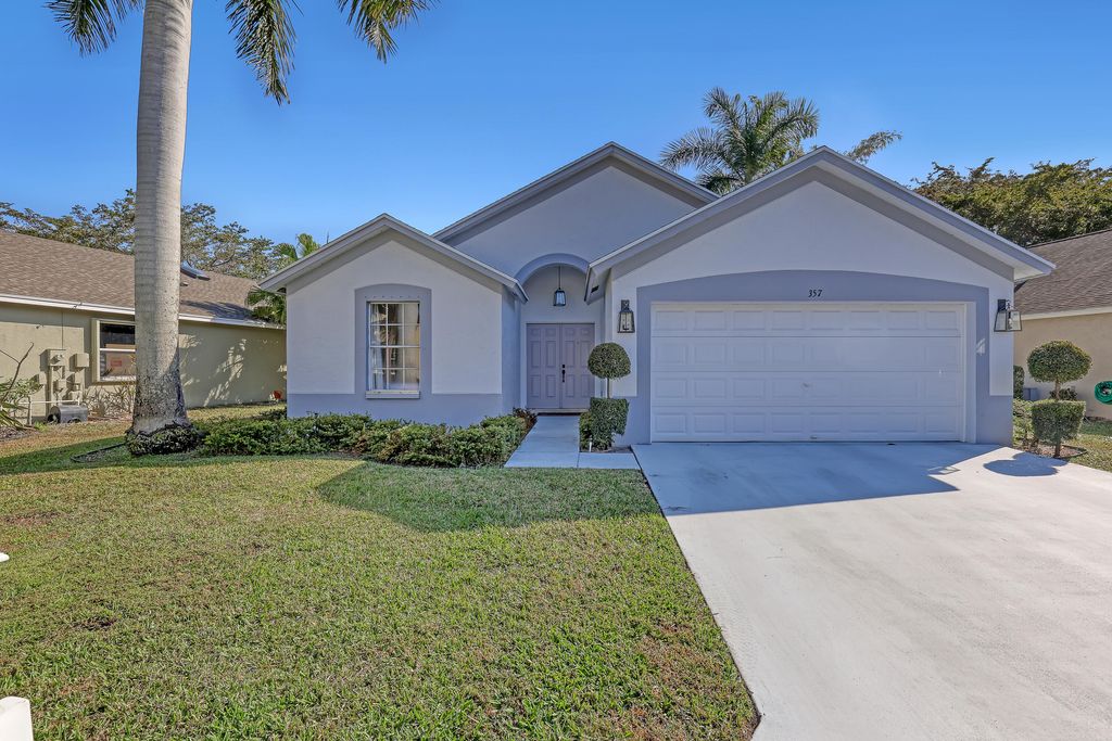 Photo of 357 Hammocks Trail, Greenacres, FL 33413 (MLS # R11165931)