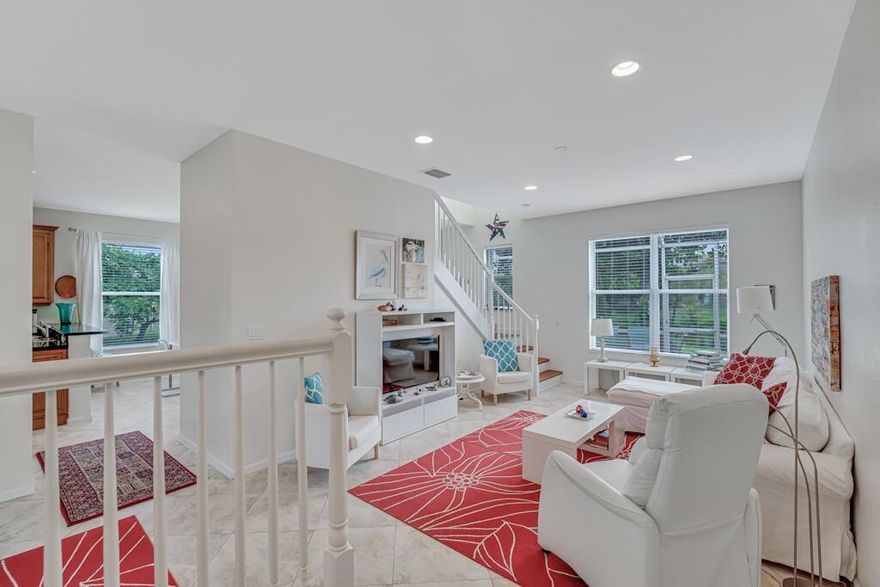 Discover this outstanding cul-de-sac waterfront  home with a flair of Scandinavian style. Located in  desirable gated Nautica Isles West, this two-story single-family residence offers 3 bedrooms and 2.5 bathrooms with a convenient, well-designed floor plan.Enjoy a beautiful 180-degree water view from the screened in patio--perfect for relaxing, BBQ and entertaining. The home also features a spacious 2-car attached garage and large paved driveway.All bedrooms are located upstairs for added privacy. The primary suite includes two walking closets and a spacious bathroom with dual sinks, a Roman tub, and a separate shower--your own spa-like retreat.The family room opens to the patio through sliding doors, creating an easy indoor-outdoor flow and letting in plenty of Fl sunshine.