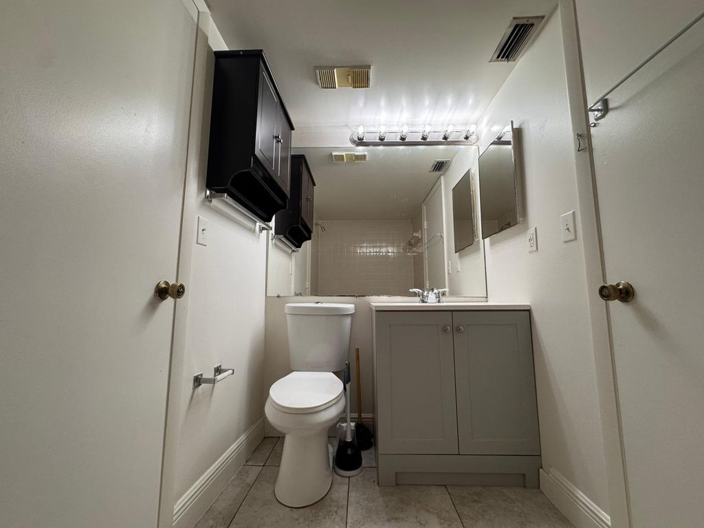 Photo of 5641 Riverside Drive #103b1, Coral Springs, FL 33067 (MLS # R11021401)