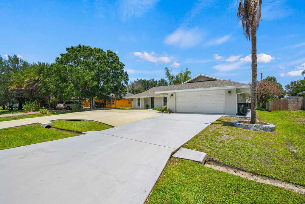 Photo of 1893 SW Angelico Lane, Port Saint Lucie, FL 34984 (MLS # B26026593)