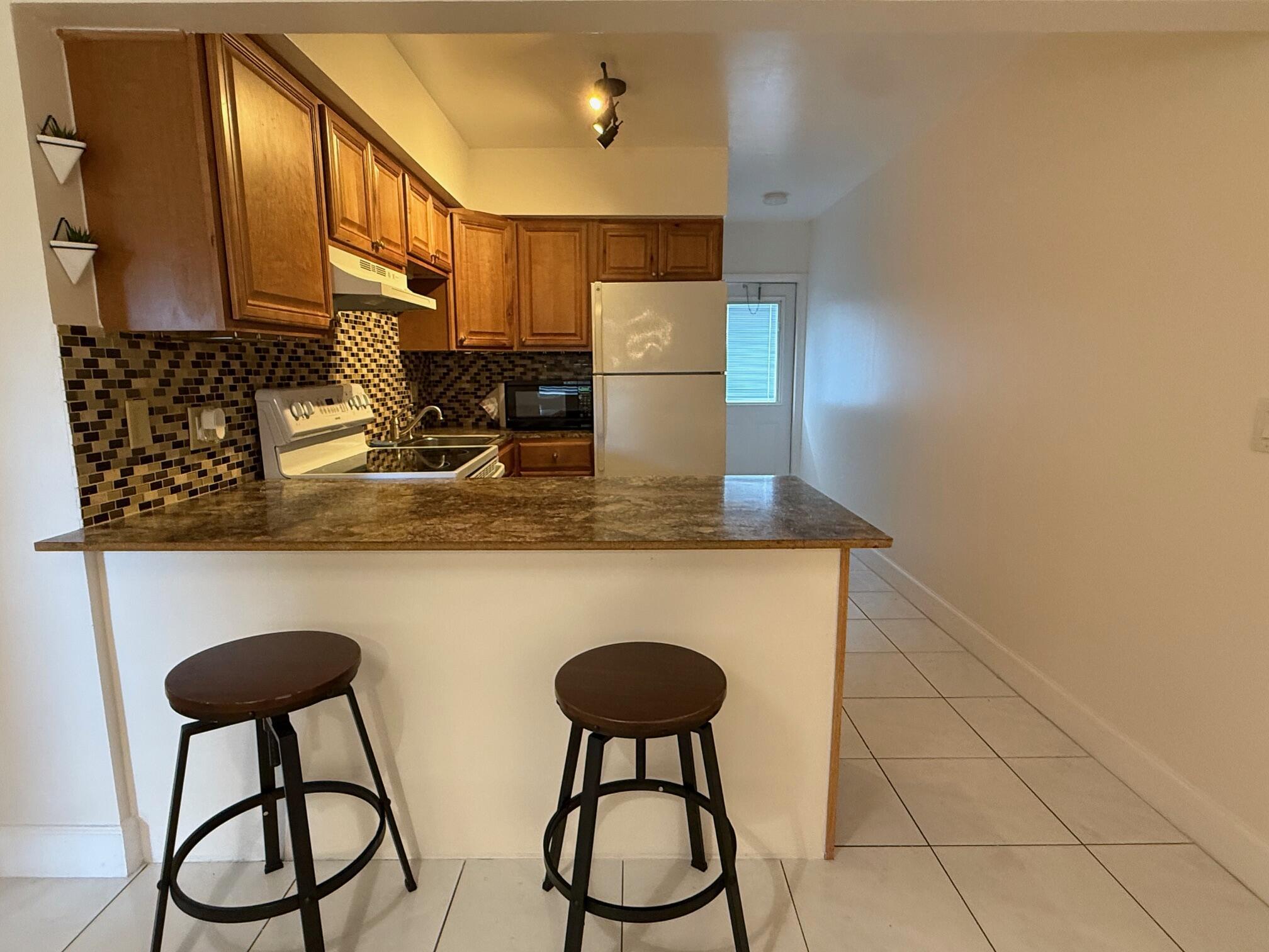 SUNLAND GARDEN APTS NUMBE - Residential Lease